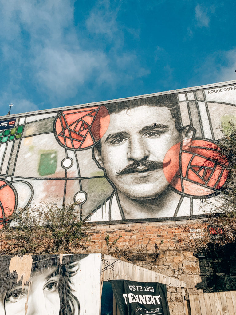 Part of the Clutha bar mural on the Glasgow Mural Trail, featuring Charles Rennie Mackintosh surrounded by roses in his art deco style