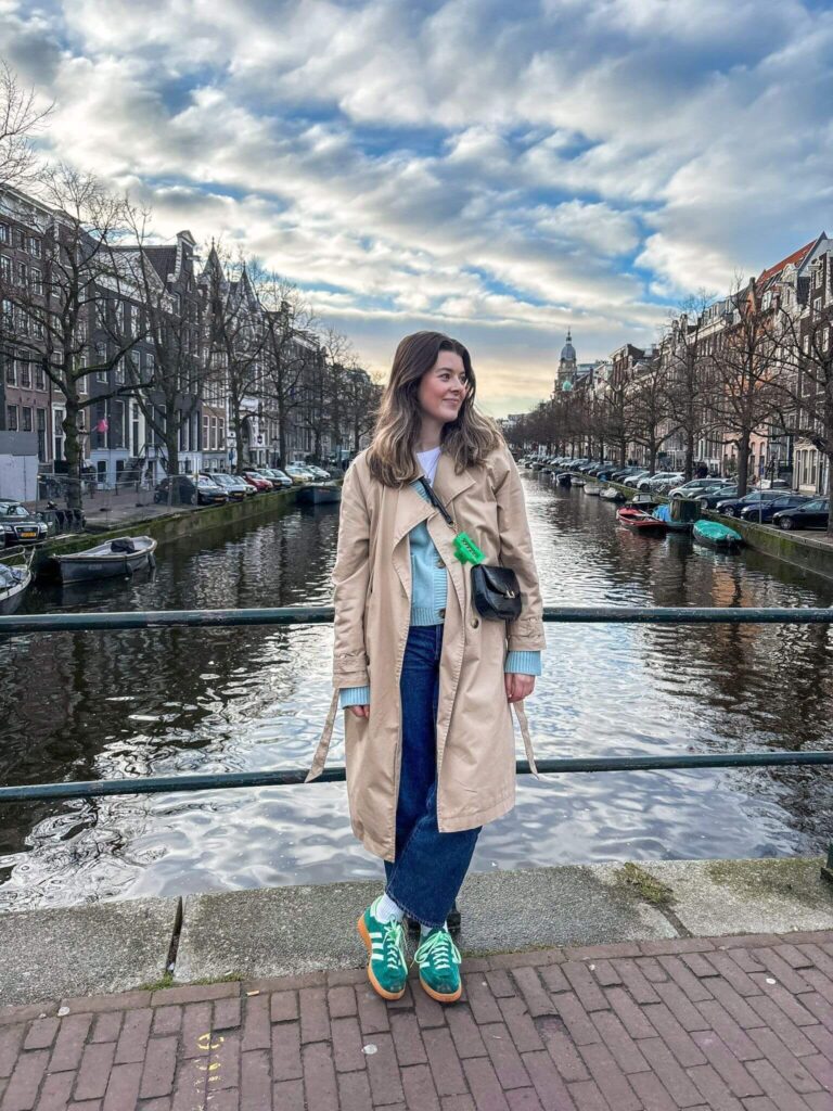 A girl on a canal bridge on Nieuwe Spiegelstraat in Amsterdam