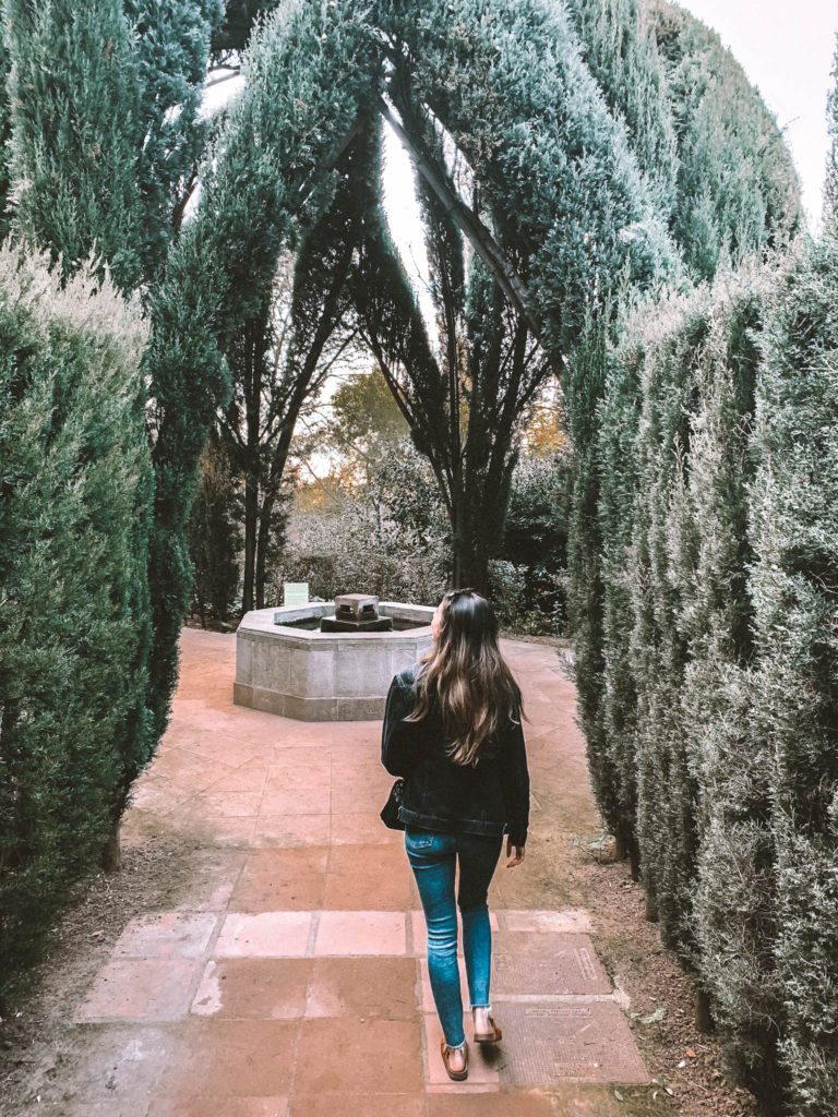 a girl explores the Laribal Gardens in Montjuic, Barcelona