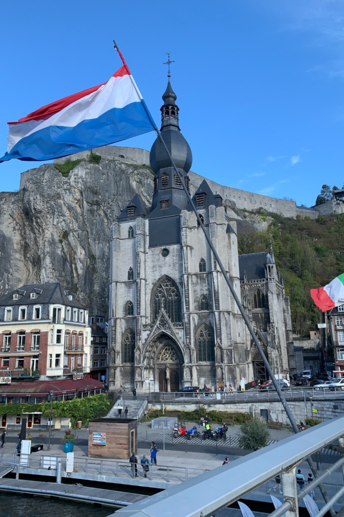 the Notre-Dame collegiate church in Dinant, with the Dinant citadel in the background