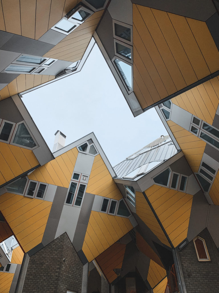 shot looking up at the yellow cube houses in Rotterdam