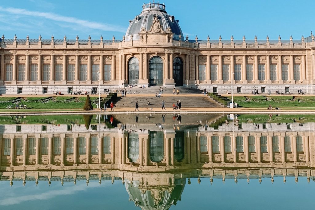 The Royal Museum for Central Africa and its reflection in a fountain, at Tervuren Park outside Brussels