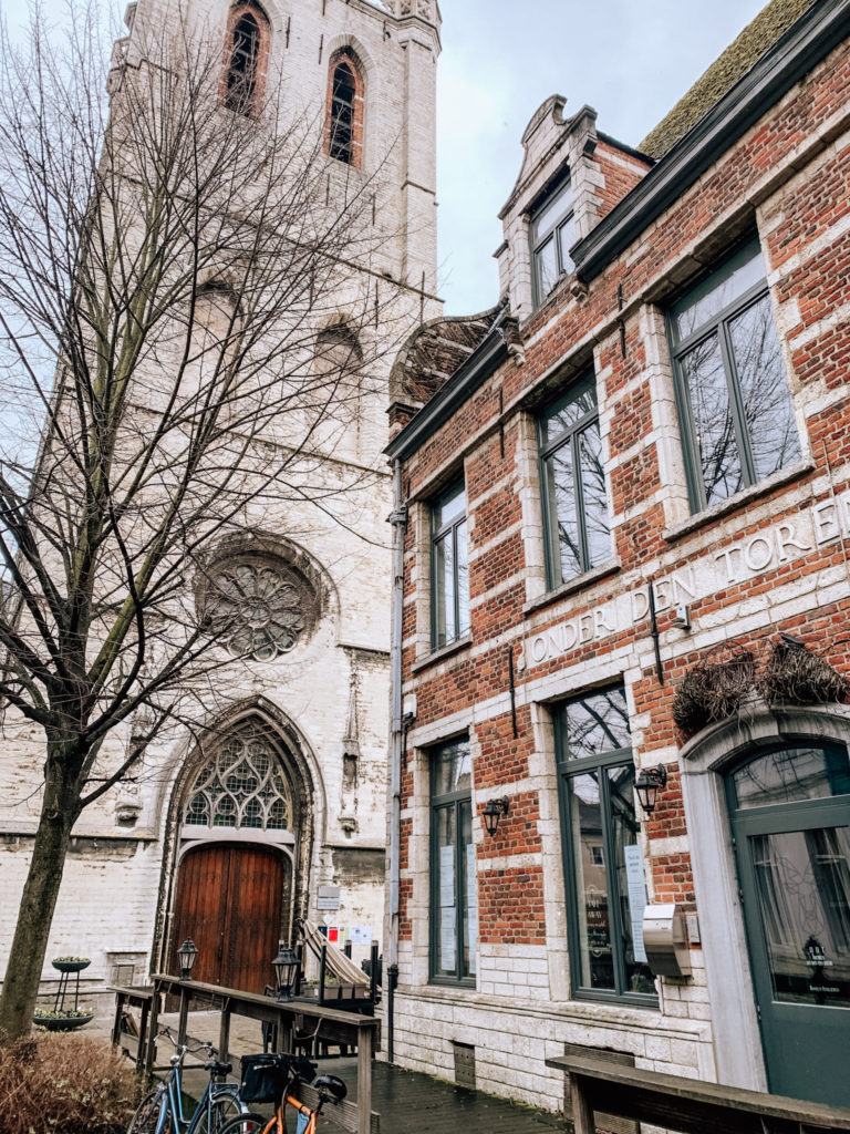 A street with a church in Leuven, Belgium