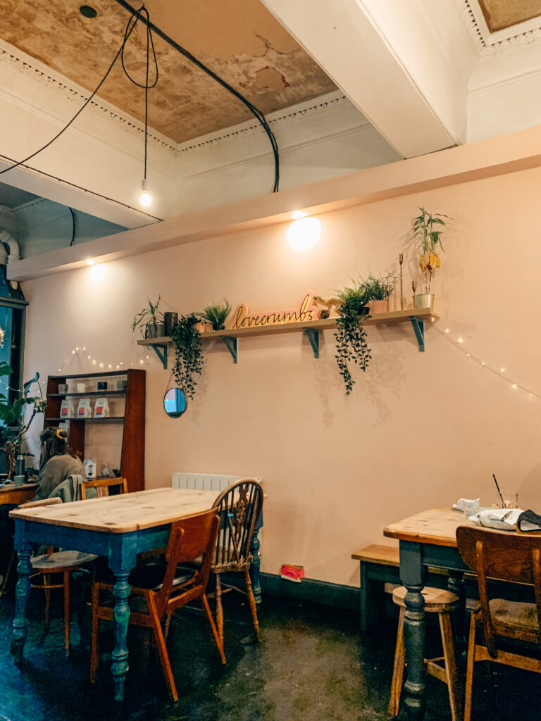 Tables inside Lovecrumbs, one of the best coffee shops in Edinburgh