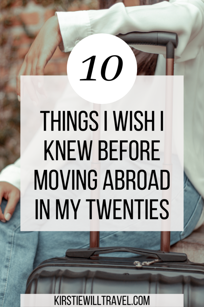 a girl sits next to a suitcase, with text overlay '10 things I wish I knew before moving abroad in my twenties'