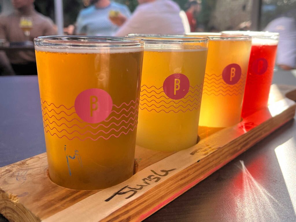 A beer flight with four beers from Brussels Beer Project