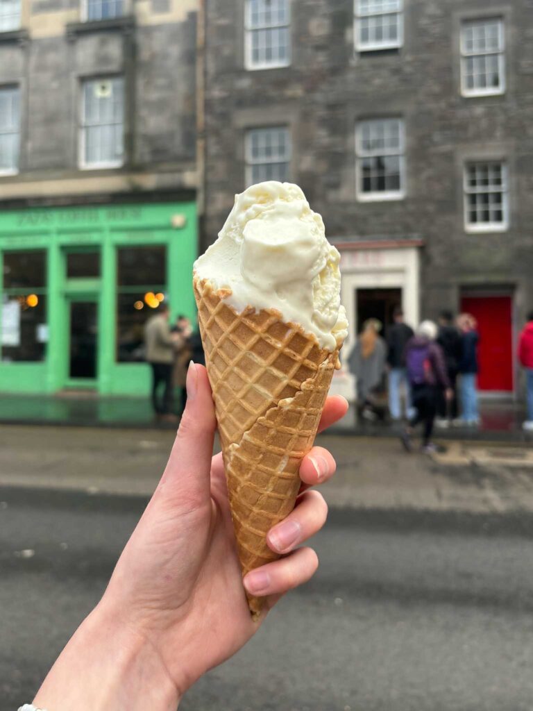 A hand holding an ice cream cone from Mary's Milk Bar in Edinburgh's Grassmarket