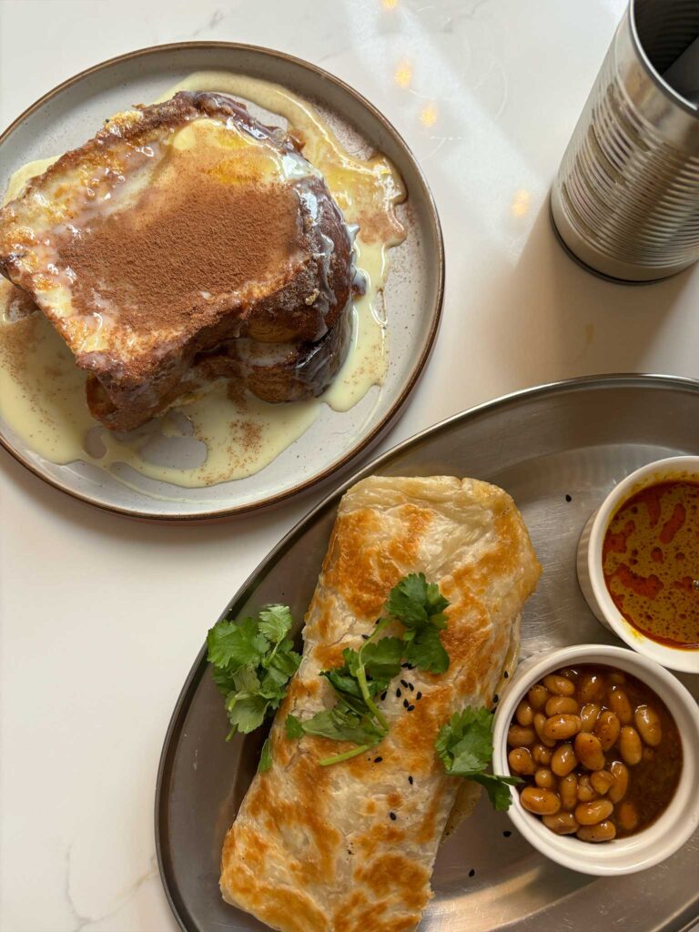 Two plates of food from Singapore Coffee House, a brunch restaurant in Edinburgh