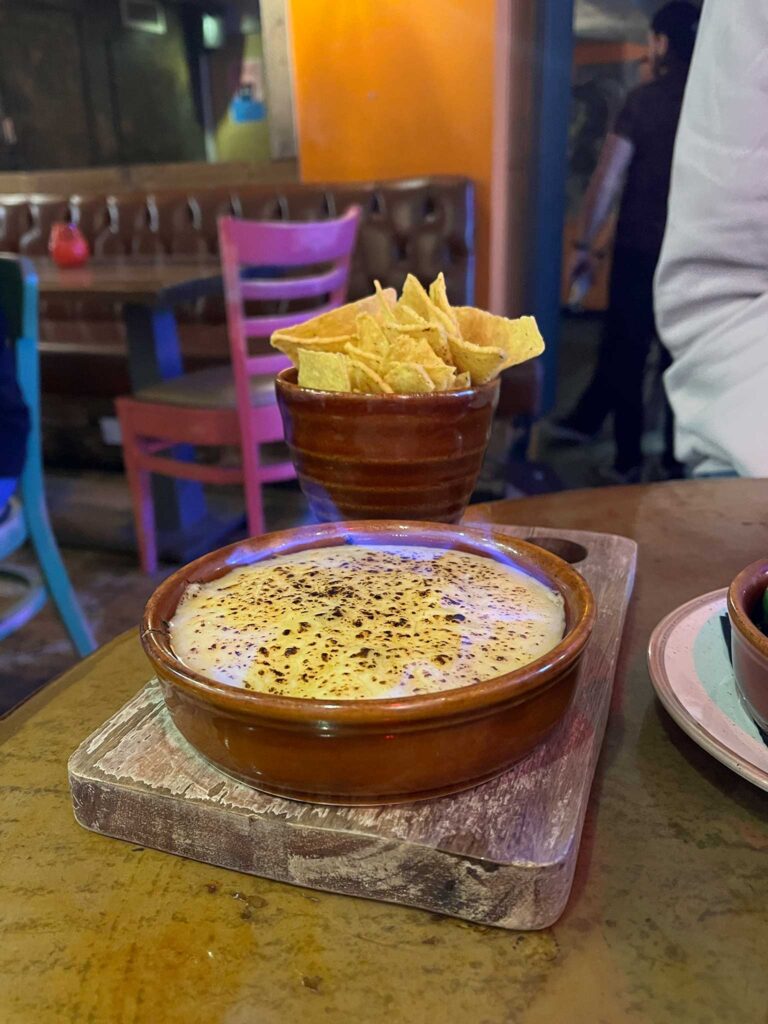 Flaming queso with tortilla chips from The Basement in Edinburgh